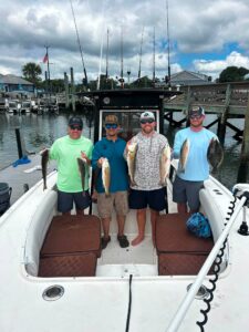 Group with Redfish and Flounder