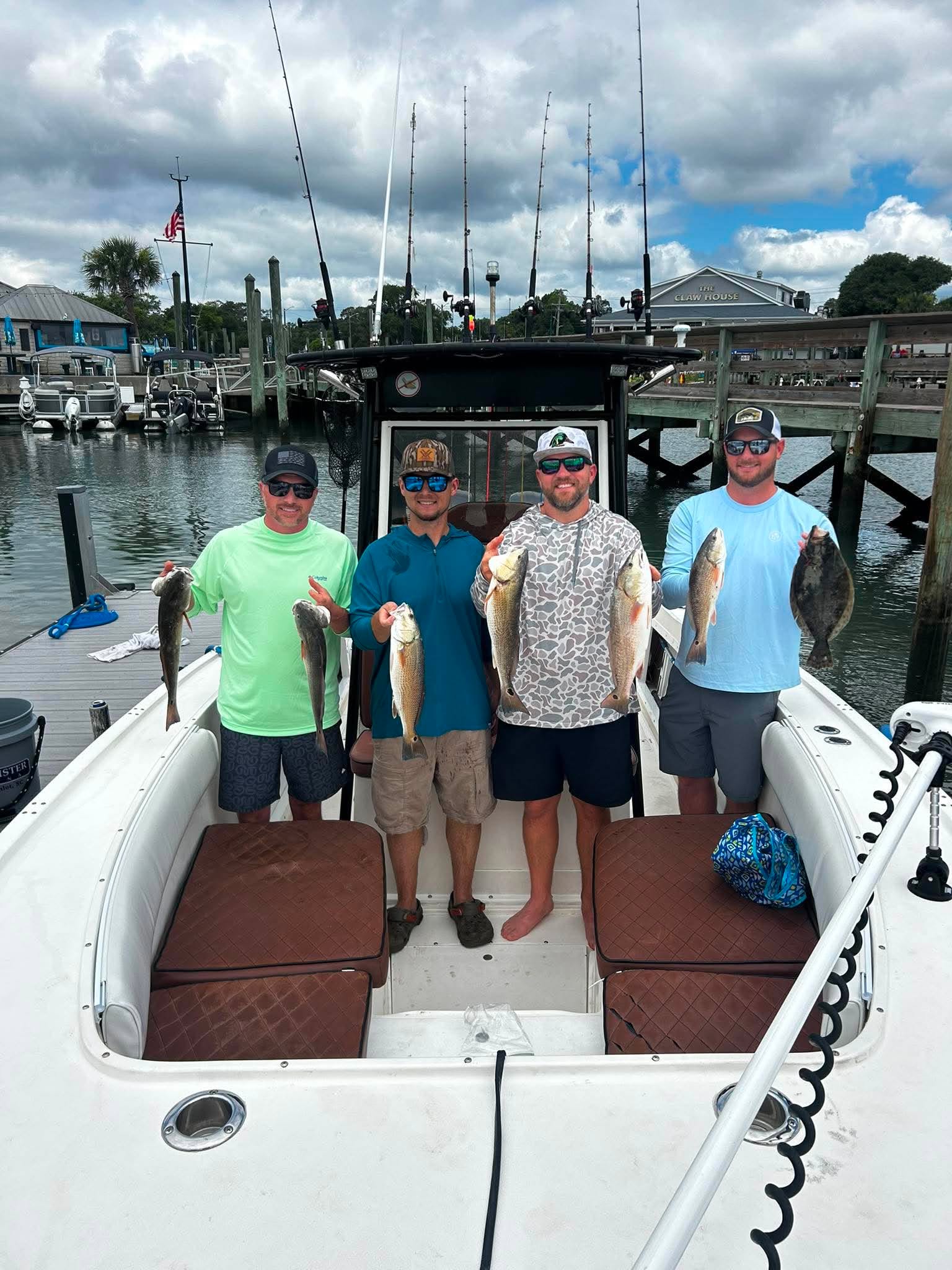 Group with Redfish and Flounder